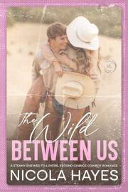 The Wild Between Us: A Steamy Enemies to Lovers Second Chance Cowboy Romance (Cowboys of Copper Creek Book 1)